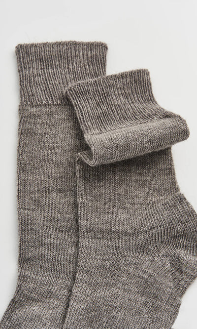 Plümo  Alpaca Socks - Slate Grey with ribbed cuffs shown flat on a white background.