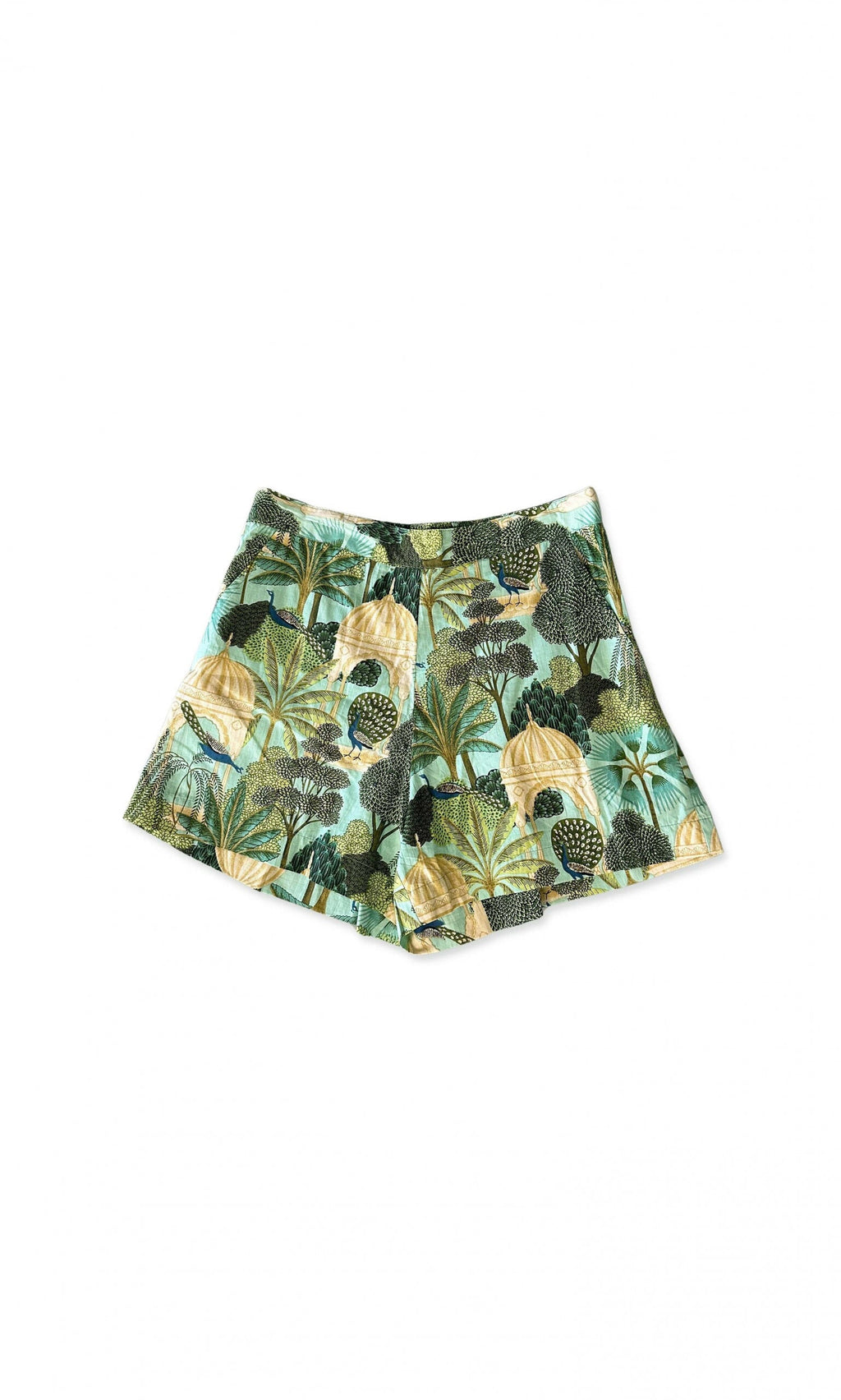 Plümo- Peacock Shorts: Green and beige high-waist shorts with a leafy botanical print on a white background.