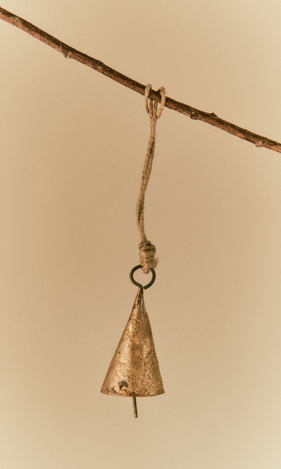 Plümo  The Hanging Brass Bell - Small dangles from twine, ready to fill the air with its gentle chime.