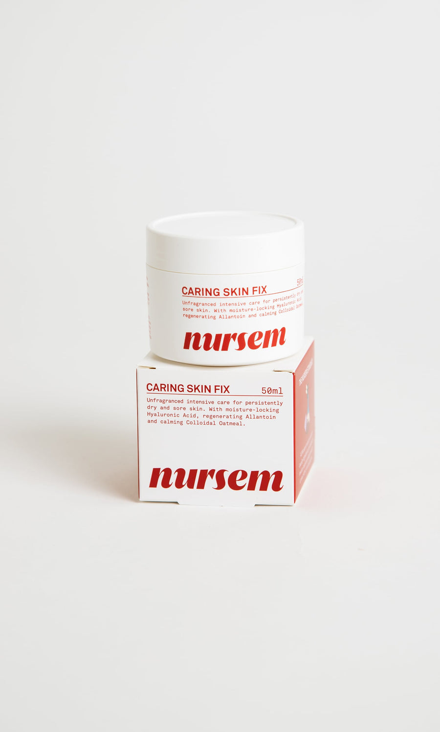 Plümo- Nursem Caring Skin Fix in a white tub and box with red text, formulated with natural ingredients for dry skin.