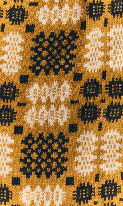 Plümo  Welsh Socks - Gold: Italian-spun yellow cotton with blue and white geometric rows for a refined tapestry look.