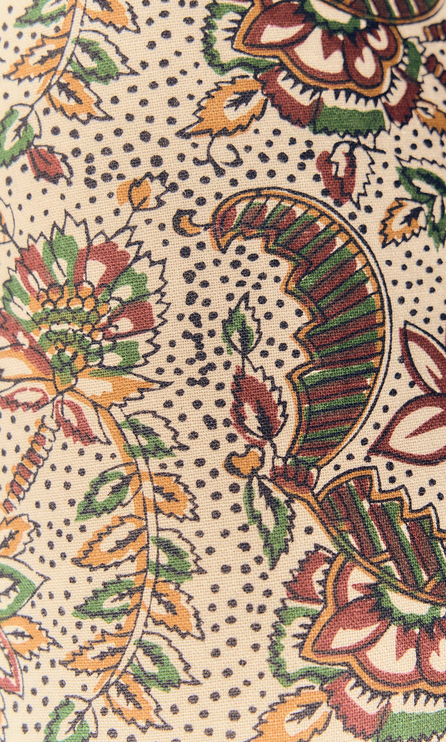 Plümo- Green, brown, and yellow floral vines and paisley on cream cotton—Printed Bolster Cushion with dotted background.