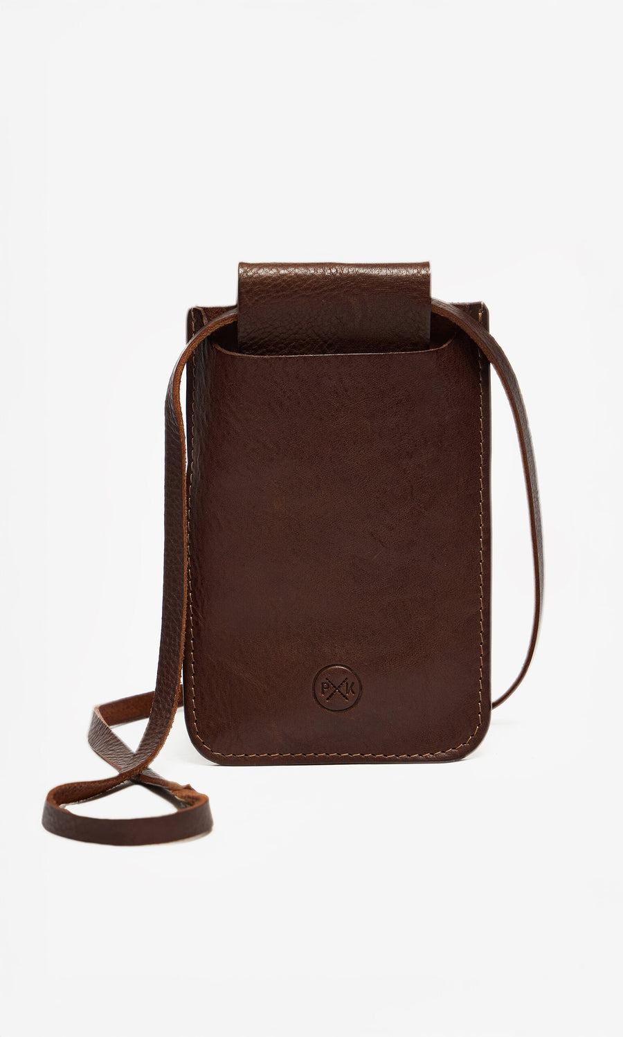 Plümo- The Purdy Bag is a dark brown, vegetable-dyed leather pouch with a flap top and long, thin strap on white background.