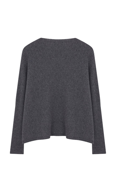 Plümo- The Alma Cardigan - Grey is a loose-fit, long-sleeve, dark gray cardigan with ribbed cuffs shown on a white background.