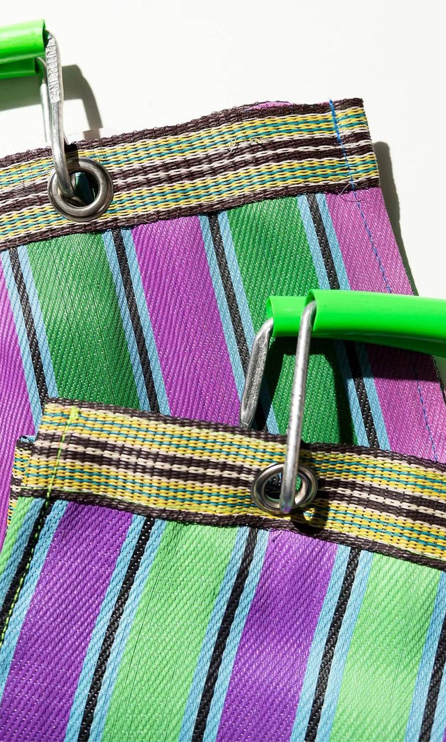 Plümo- Two Recycled Stripe Shopper bags with green handles and metal grommets shown against a white background.