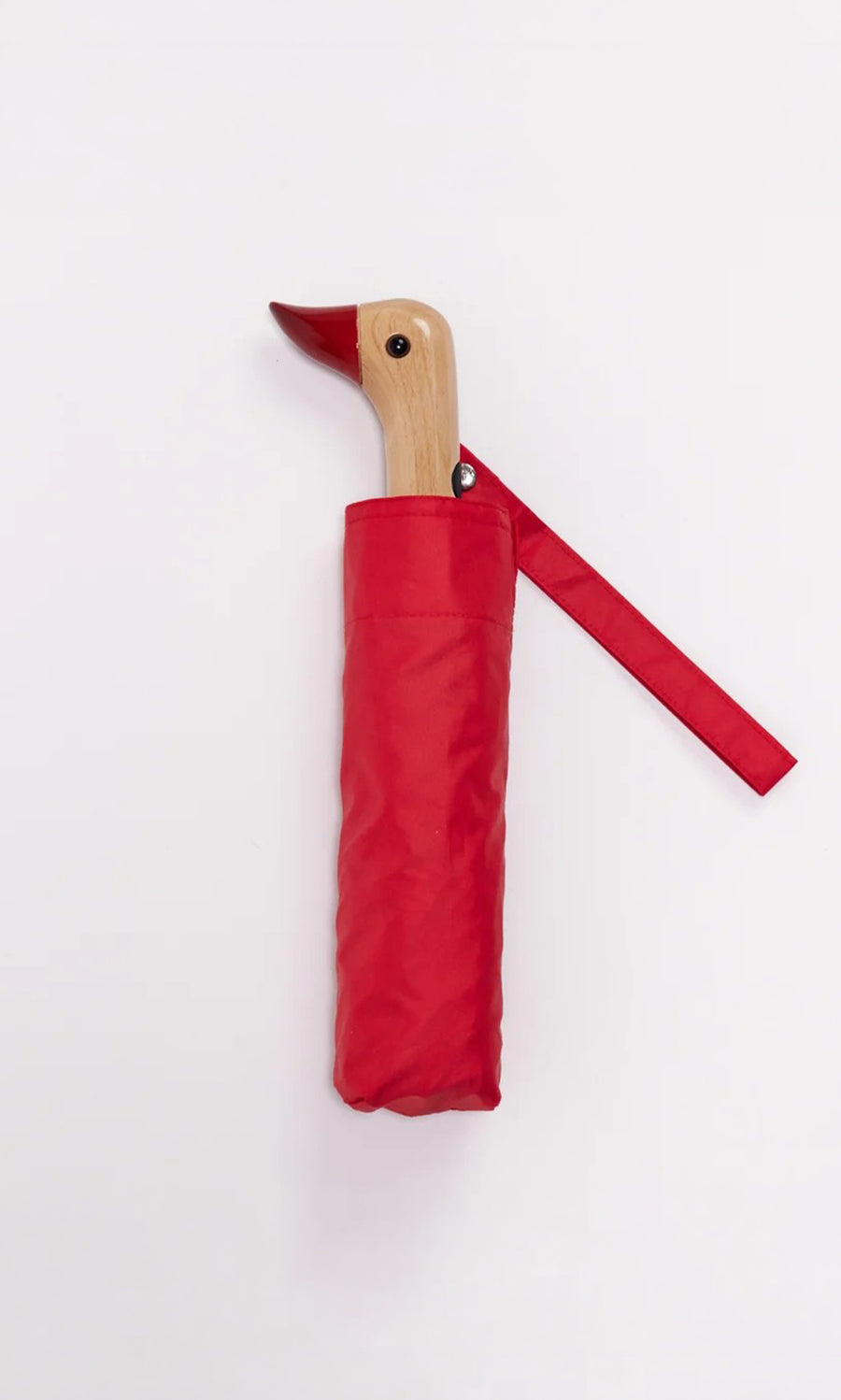 Plümo  The Duck Umbrella - Red features a compact design and a duck-shaped wooden handle, set against a white background.