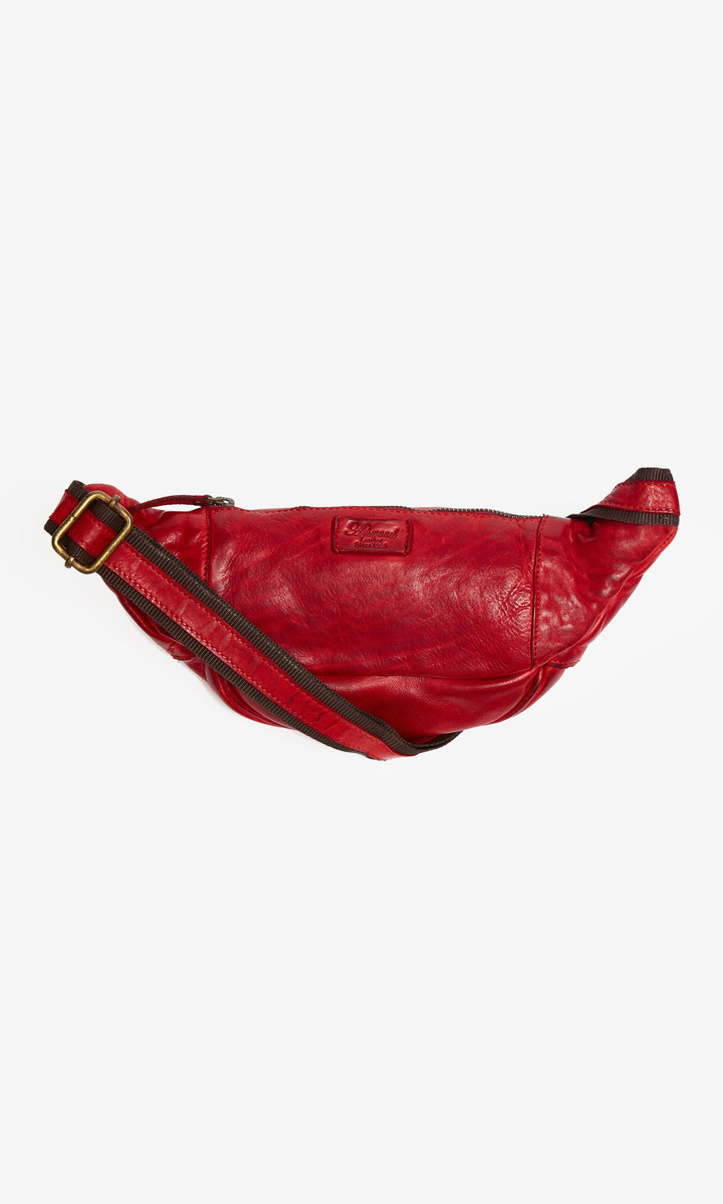Plümo- Redwick Bag: red leather crossbody with British design, brown adjustable strap, and gold buckle on white background.