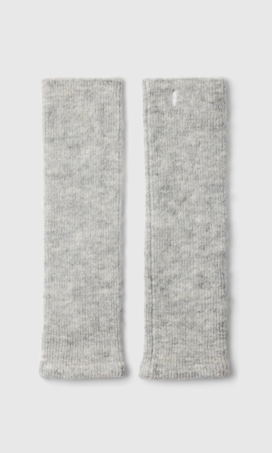 Plümo  Set of two light gray Grey Wrist Warmers, Danish design; one features a buttonhole near the top edge.