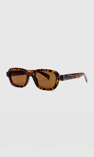 Plümo- Portia Sunglasses: rectangular tortoiseshell frames with UV lenses on a plain light grey background.