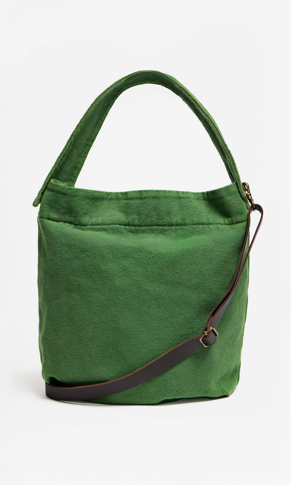 Plümo- Selva Canvas Bag—green cotton tote with crossbody strap and handle, made in Barcelona, shown on white background.