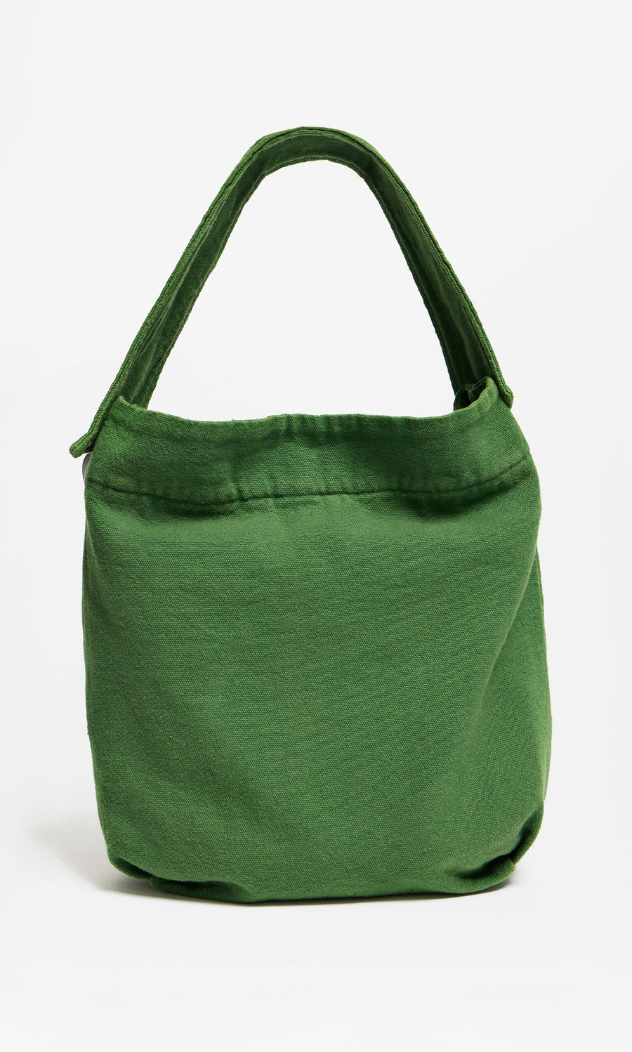 Plümo- The Selva Canvas Bag, green cotton-canvas with a wide handle, made in Barcelona, shown on a white background.