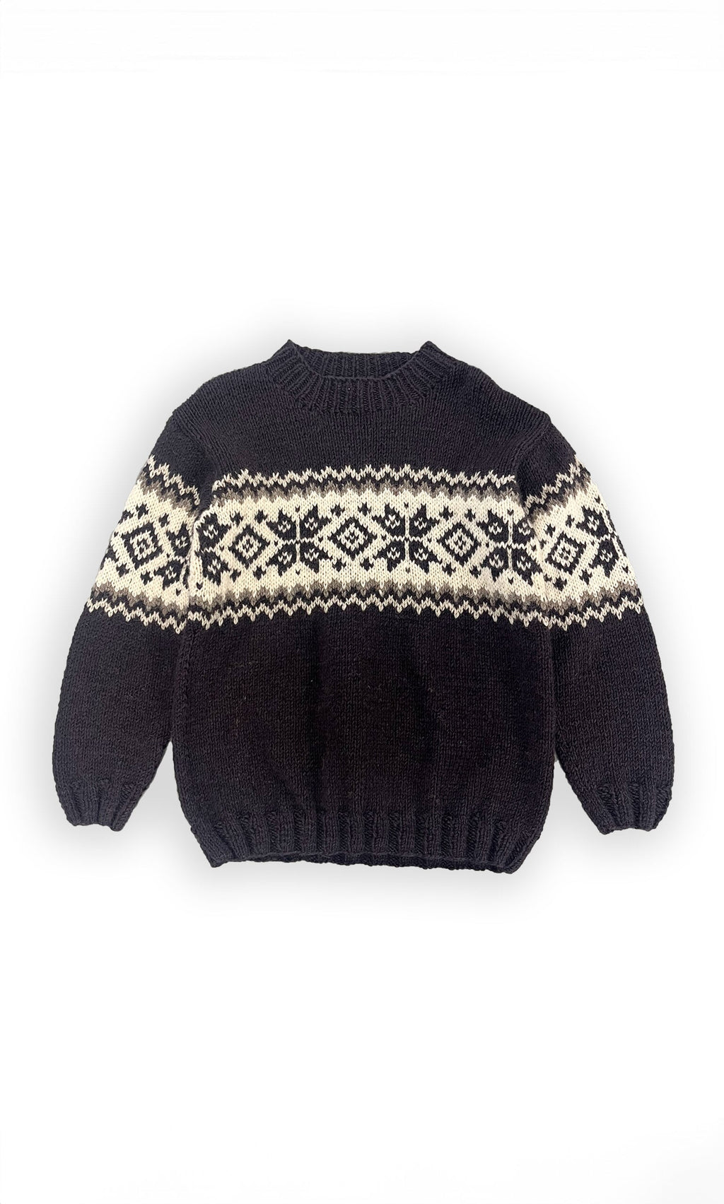 Plümo- Shingle Jumper: black knit sweater with white Fair Isle snowflake pattern, shown flat on a white background.