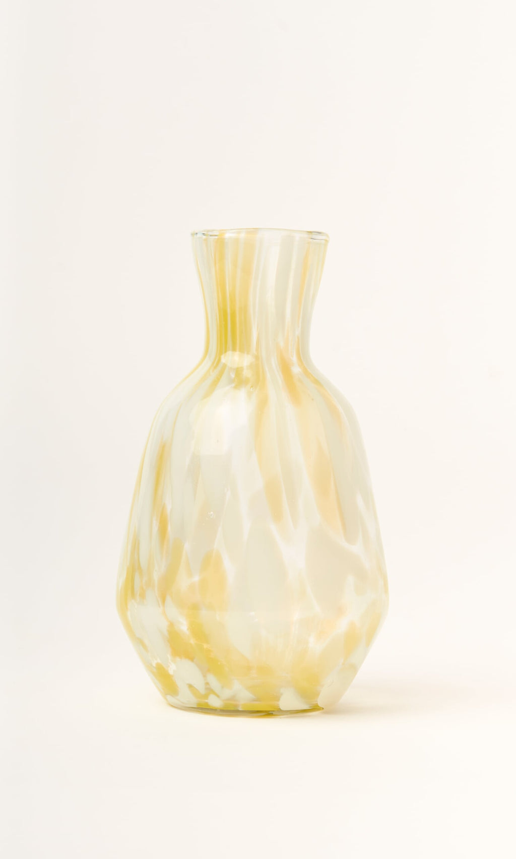 Plümo- The Speckled Glass Jug - Yellow is handmade with a wide base, narrow neck, and yellow-white marbled design.