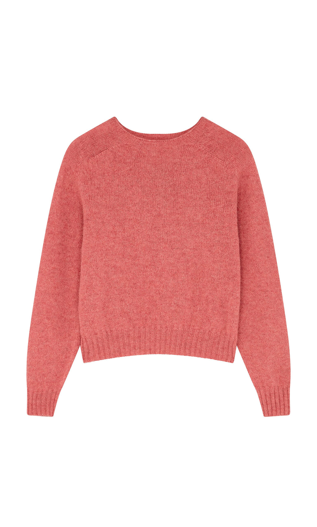 Plümo- The Wicklow Crewneck in Tea Rose is a plain, long-sleeve seam-free sweater with ribbed cuffs and hem.