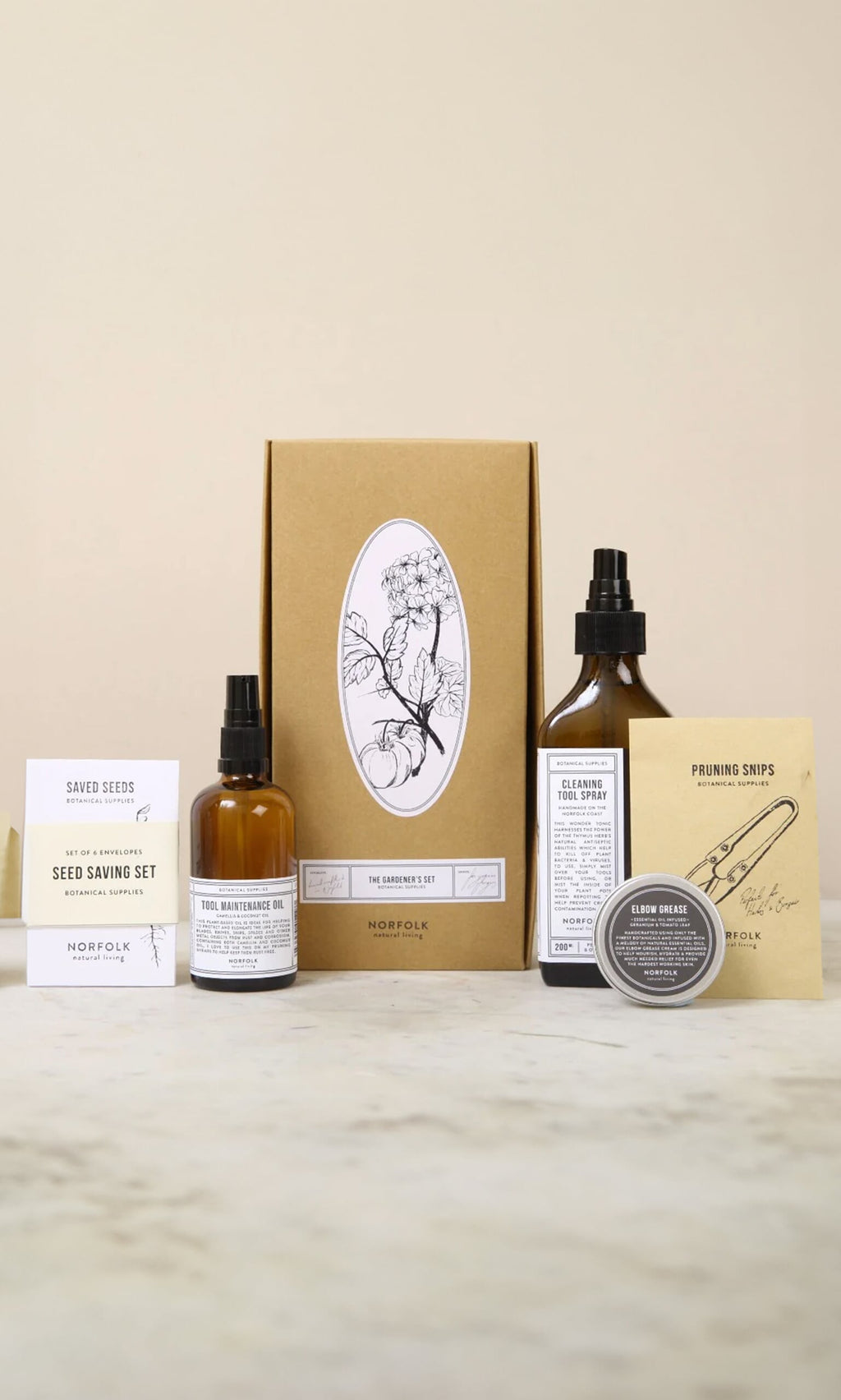 Plümo- The Gardeners Gift Set: bottles, seed packets, snips & balm tin—an ideal vegan gardening gift.