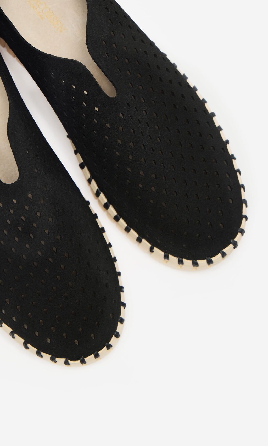 Plümo- Close-up of Tulip Shoes - Carbon with light soles, made from recycled microfibre, on a white background.