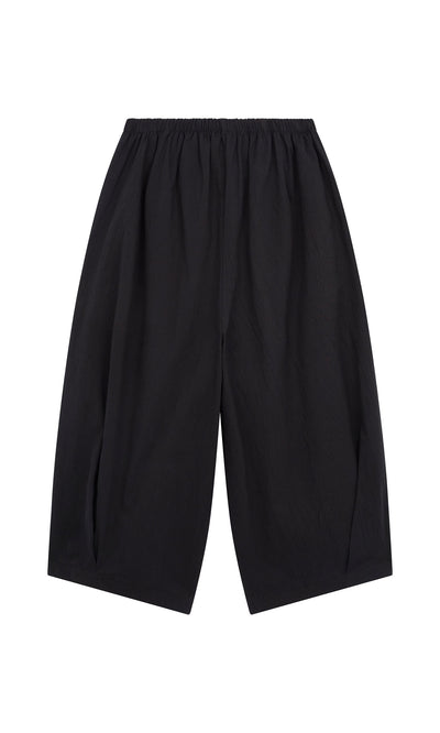Plümo- Black Pinch Pants with an elasticated waist, loose fit, shown laid flat on a white background.