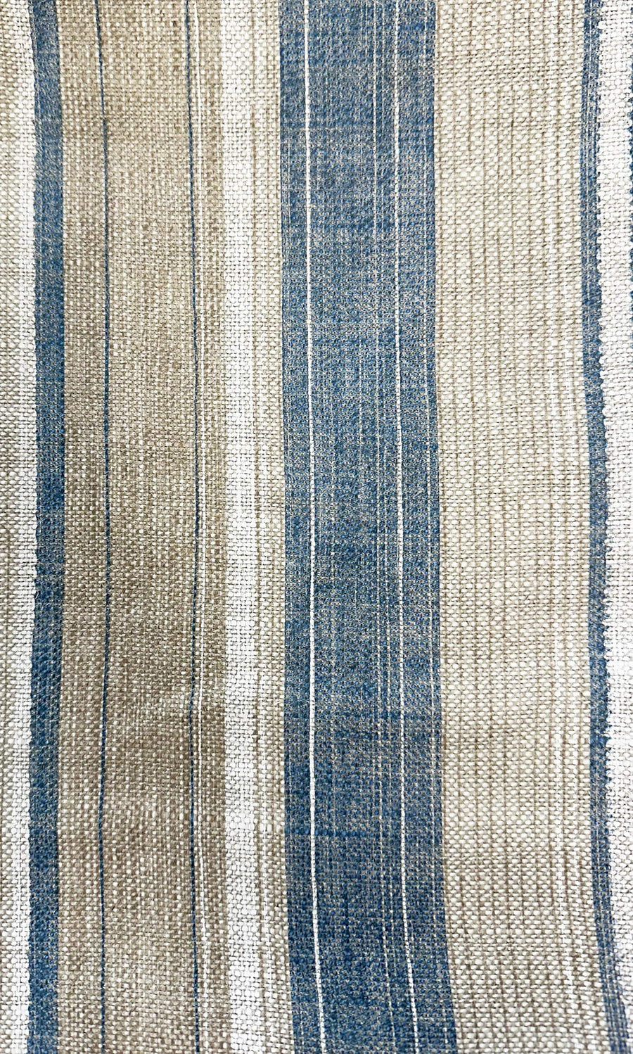Plümo- Fermoie Carskiey Stripe Fabric features blue, beige, and white textural stripes for a natural fiber upholstery look.