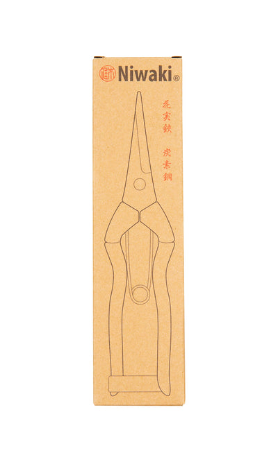 Plümo- Brown cardboard box with a line drawing of red garden snips, Niwaki branding, and "handmade in Japan" details.