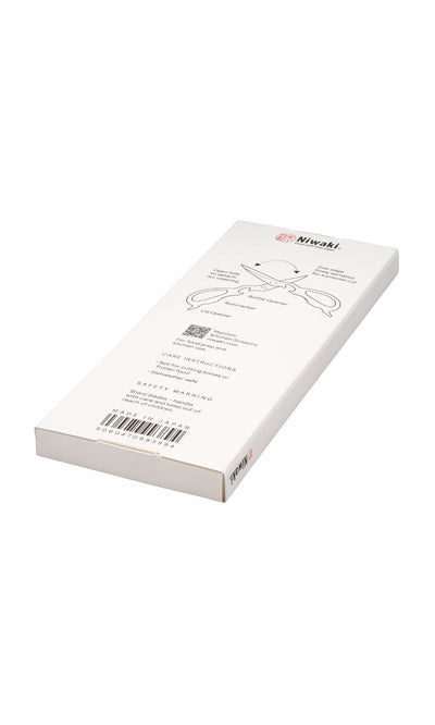 Plümo- Yellow rectangular packaging for Niwaki kitchen scissors, made in Japan, with care instructions and diagram on back.
