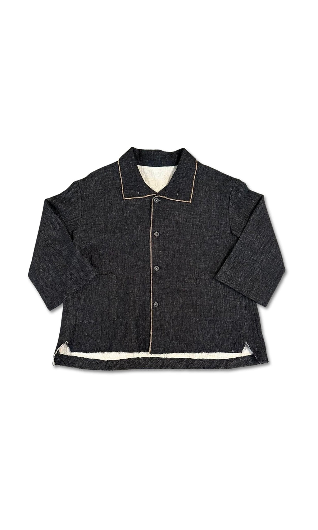 Plümo- Raw Edge Blazer: black with tan trim, long sleeves, textured finish, and white inner lining on a white background.