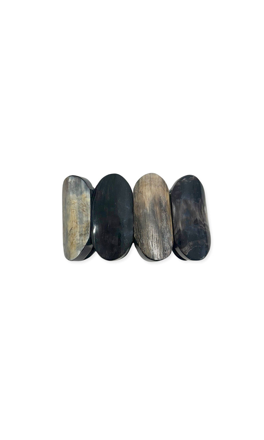 Plümo- The Kovi Bracelet is a four-piece, oval-shaped dark horn hair barrette with a modern design on a white background.