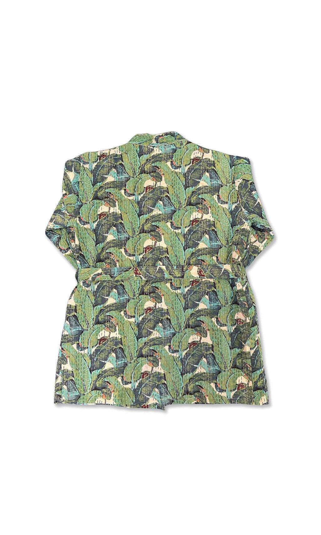 Plümo- Back of the Musa Quilted Kantha in green with a jungle leaf print and playful monkeys on white.
