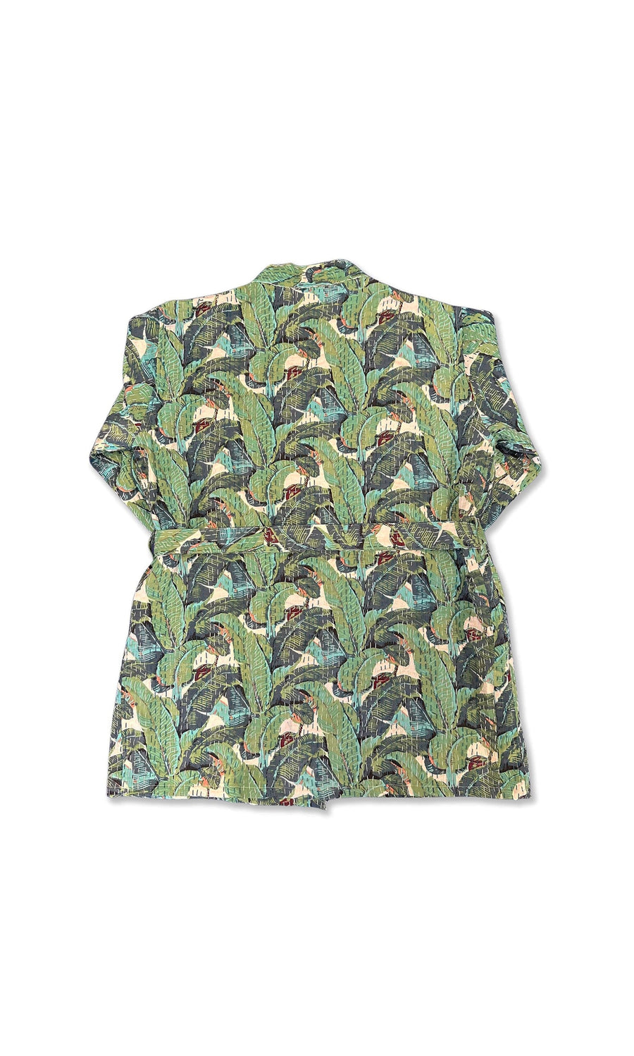 Plümo- Back of the Musa Quilted Kantha in green with a jungle leaf print and playful monkeys on white.