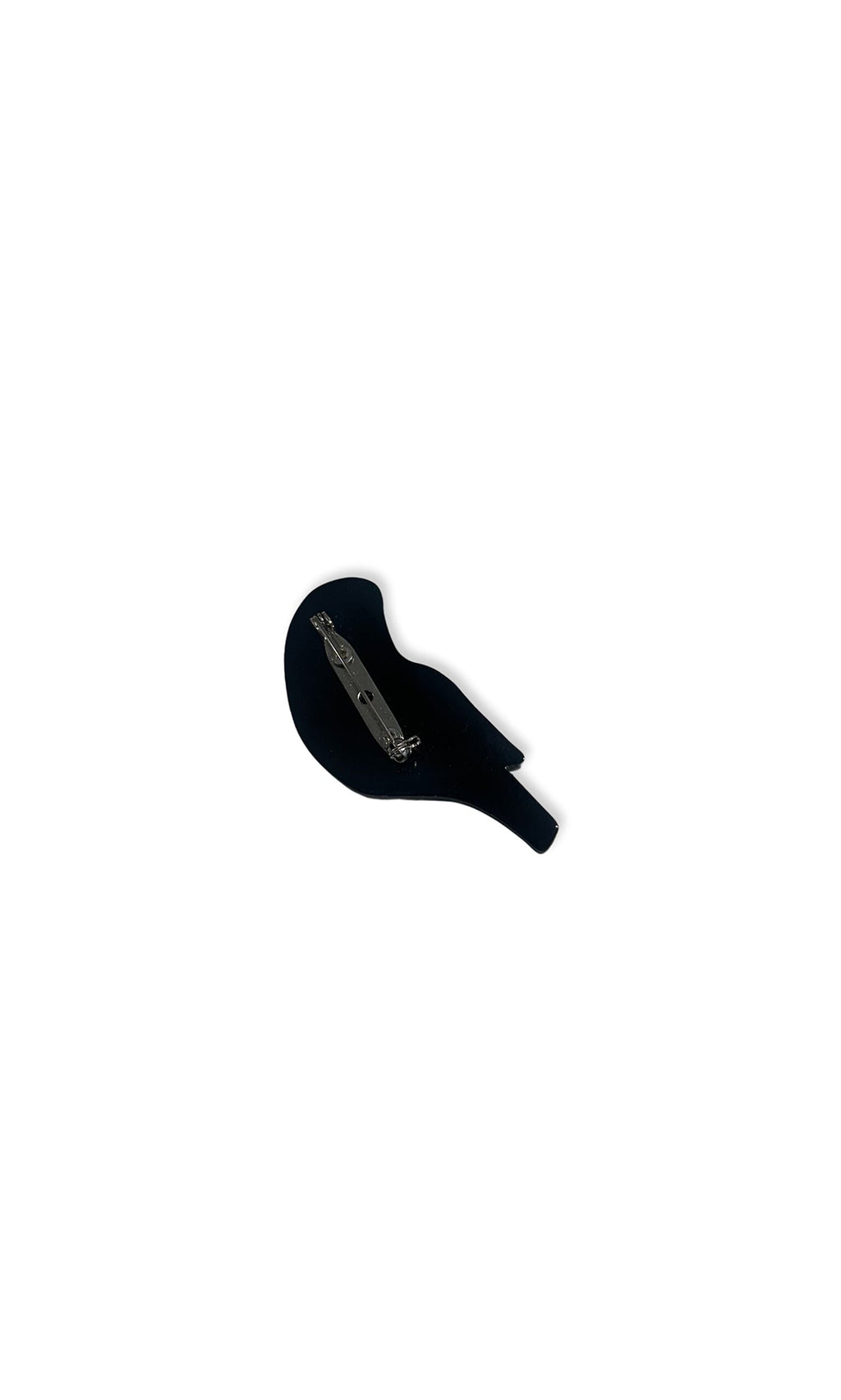 Plümo- The Birdie Brooch is a black bird-shaped hair clip with a metal clasp, inspired by African craftsmanship.