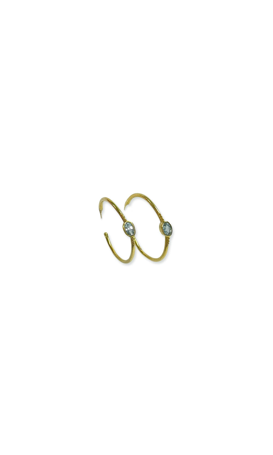 Plümo- Blue Topaz Hoops: Gold hoop earrings each set with a round blue topaz, perfect chic style for any occasion.