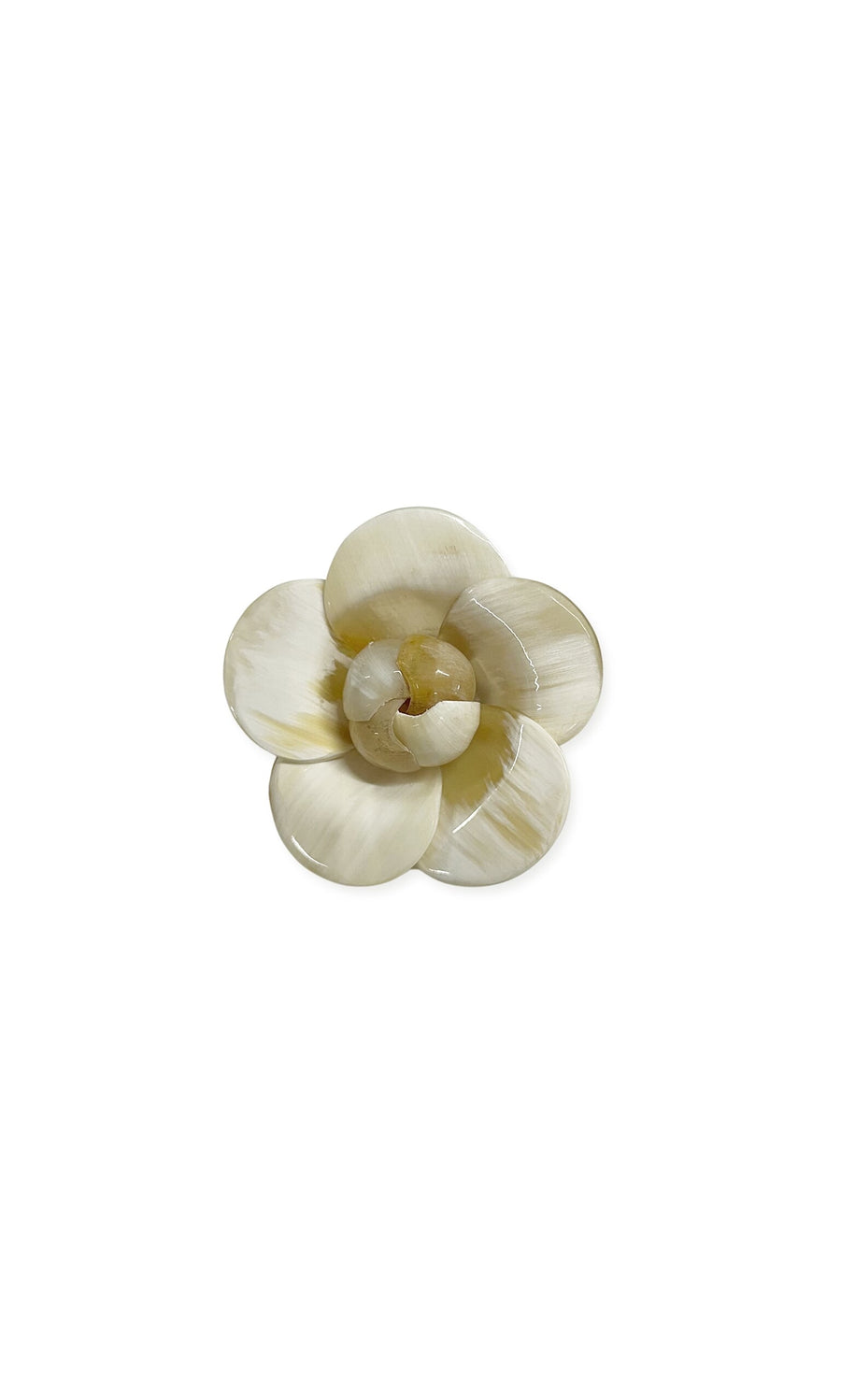 Plümo- Camelia Flower Brooch: Cream hand-carved, layered petals in a circle on white background.