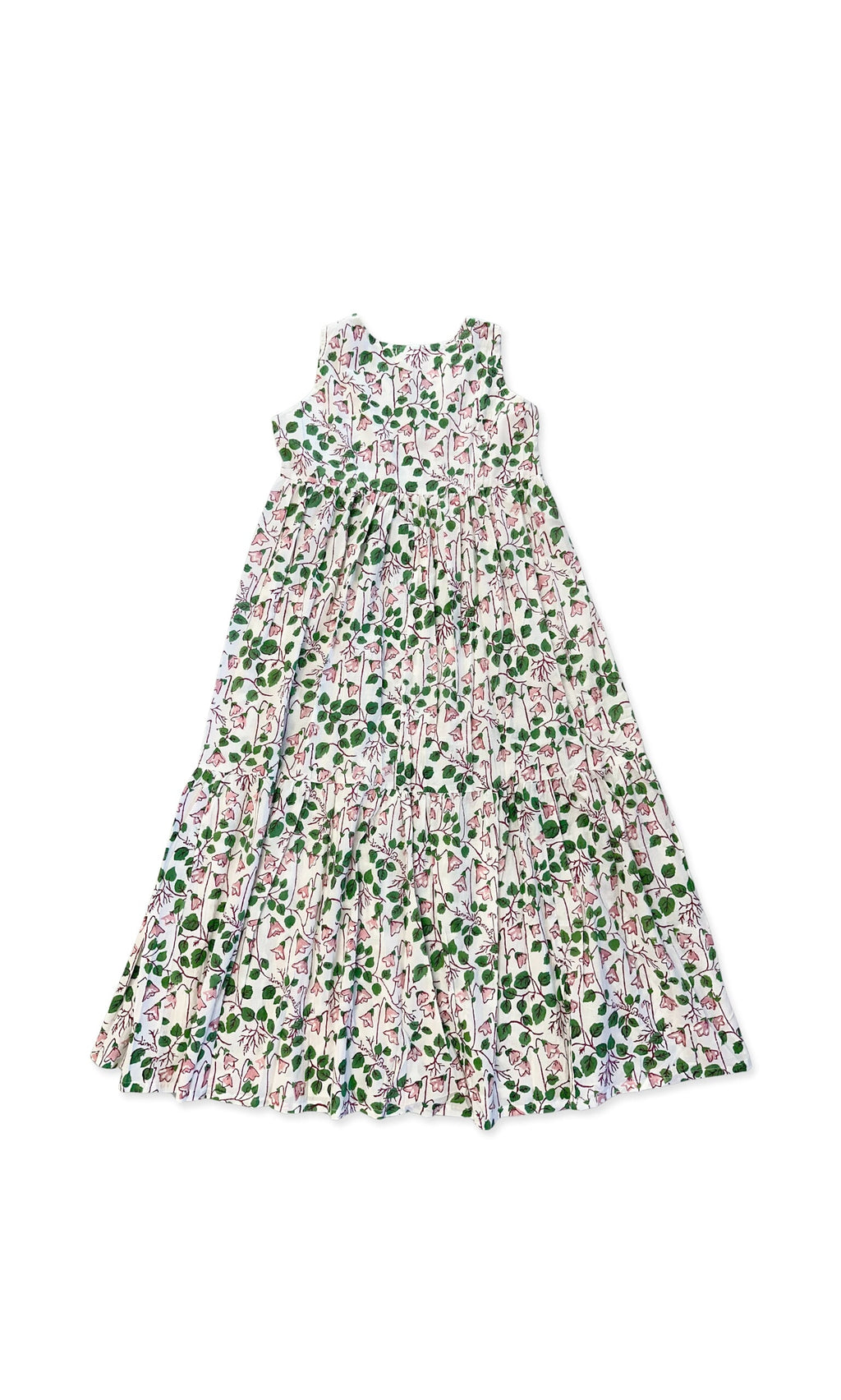 Plümo- The Connie Dress is a sleeveless long dress with a tiered skirt and hand-printed florals on a white background.