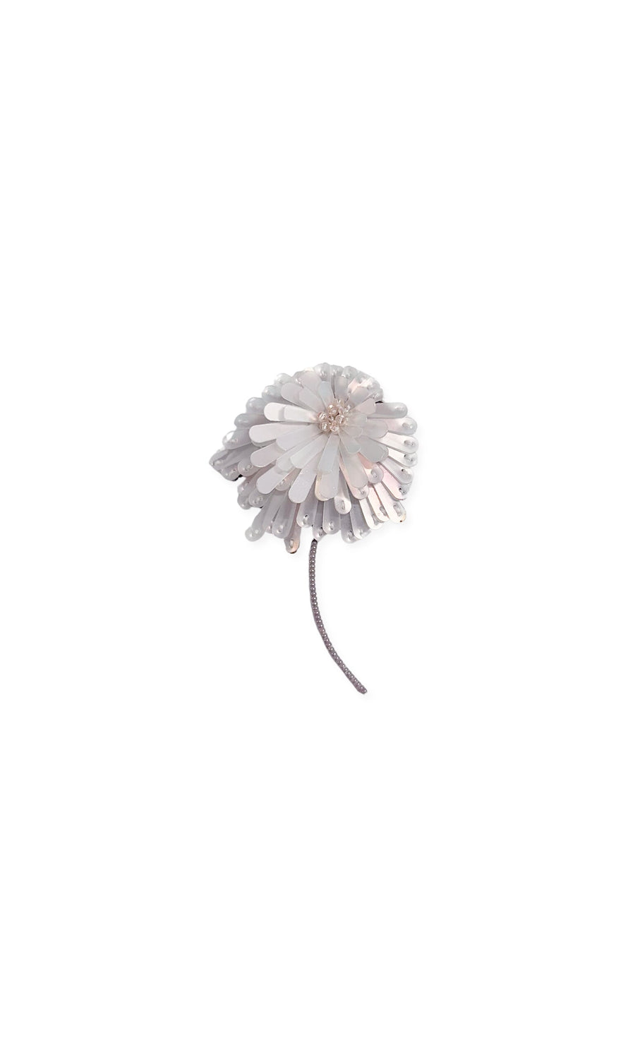 Plümo- The Dandelion Brooch features layered white and silver petals with a long stem, displayed on a white background.