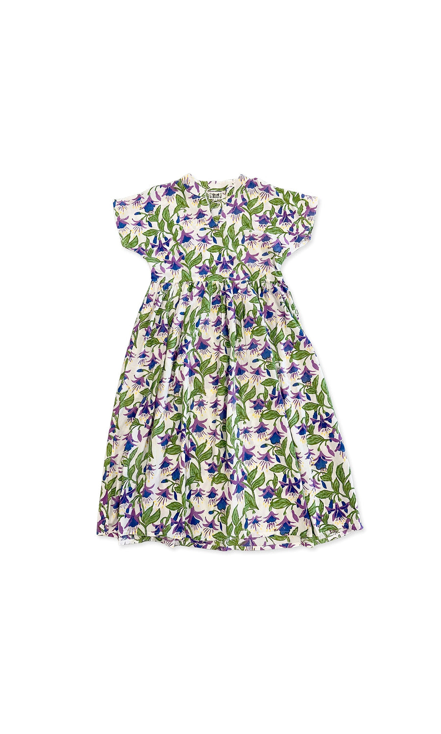 Plümo- The Fuchsia Dress is a short-sleeve, pleat-waist style with a purple, green, and white hand-printed floral pattern.