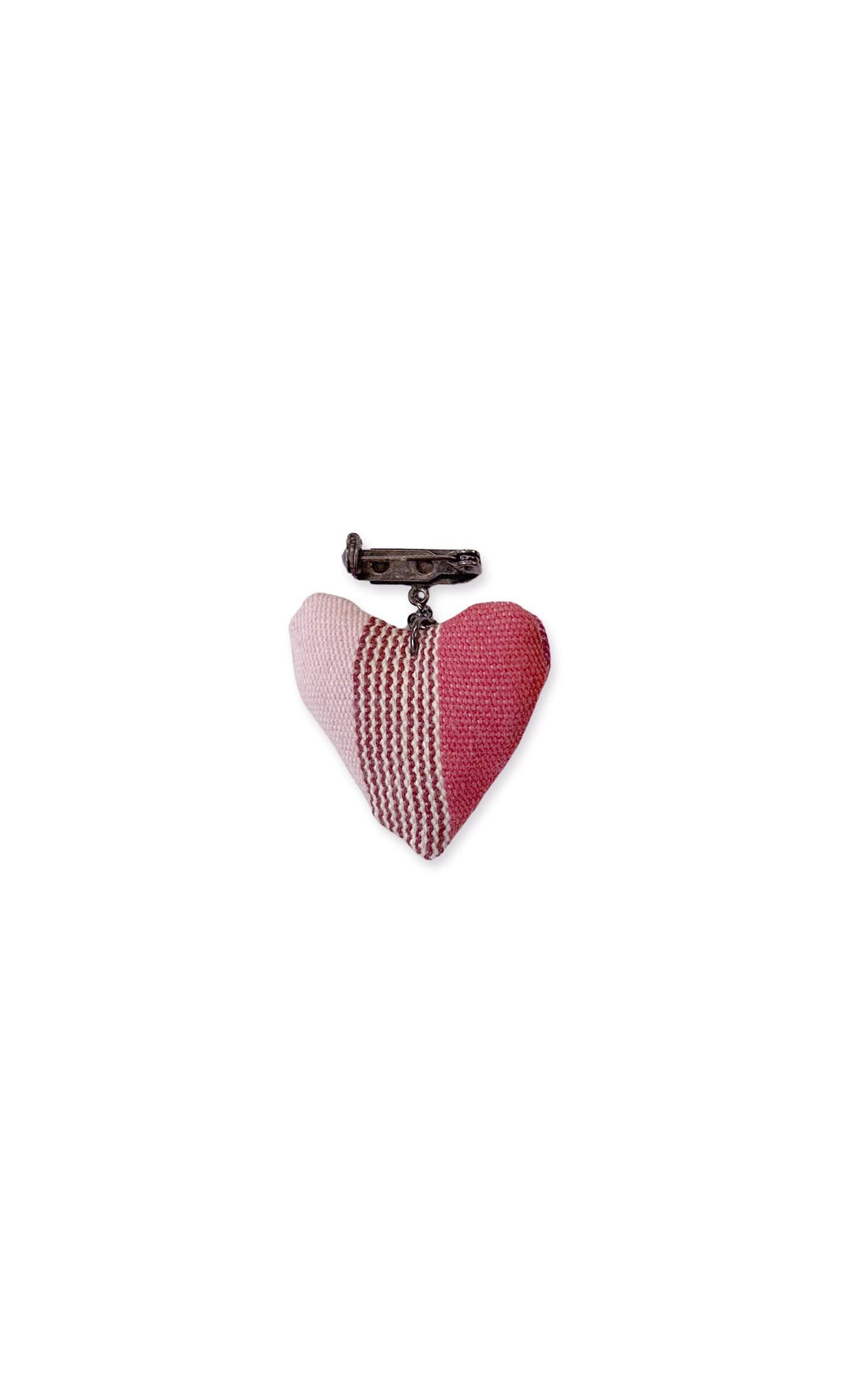 Plümo- Heart Charm Brooch: A handcrafted striped pink and red heart pin with metal clasp on top.