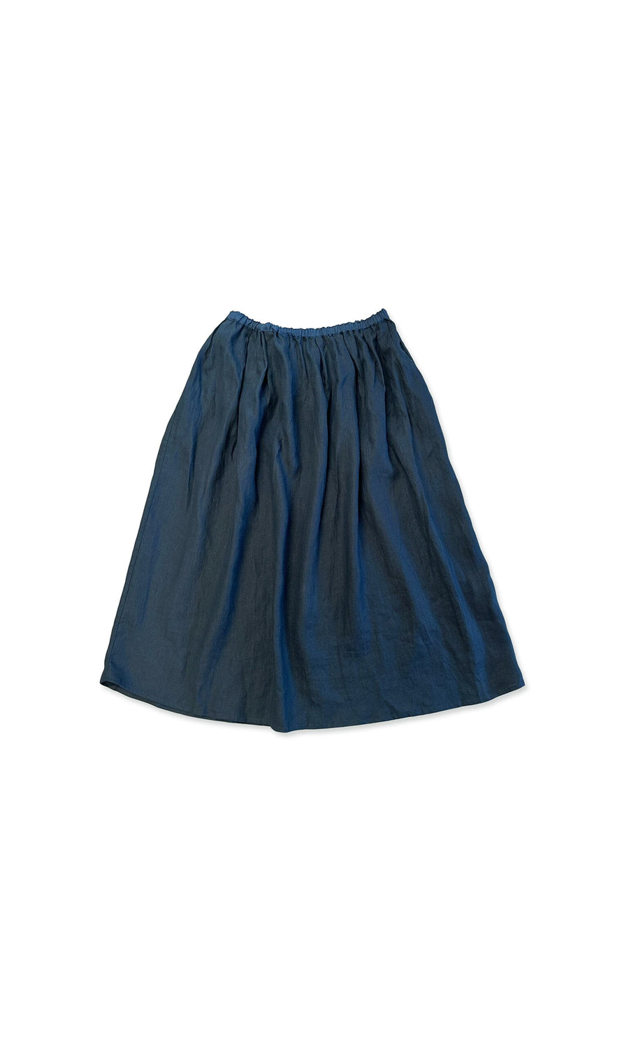 Plümo- The Idora Skirt is a navy, knee-length A-line skirt with an elastic waistband, shown on a white background.