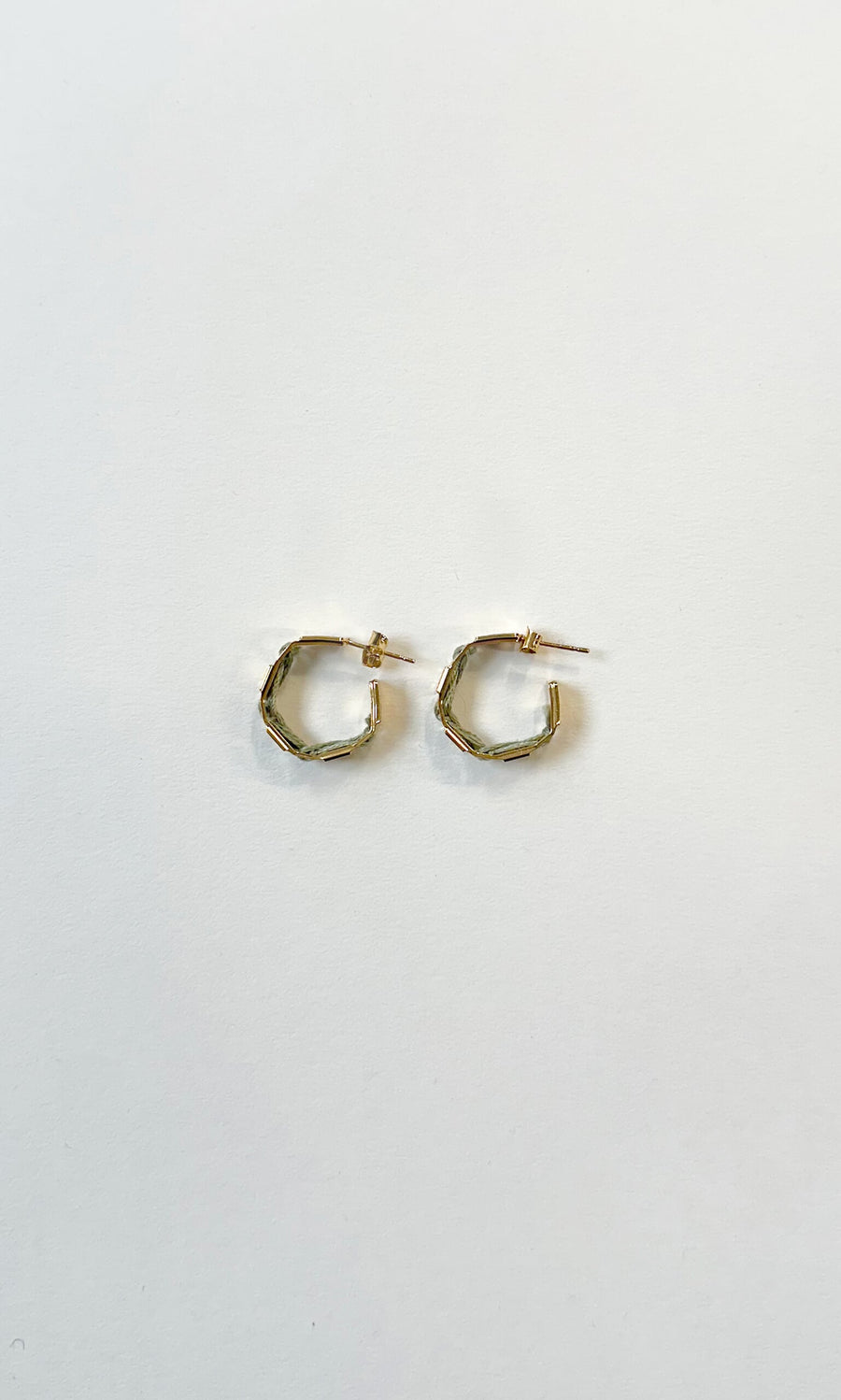 Plümo- Ivana Hoops: small handcrafted gold hoop earrings with a hexagonal geometric design on a plain white background.