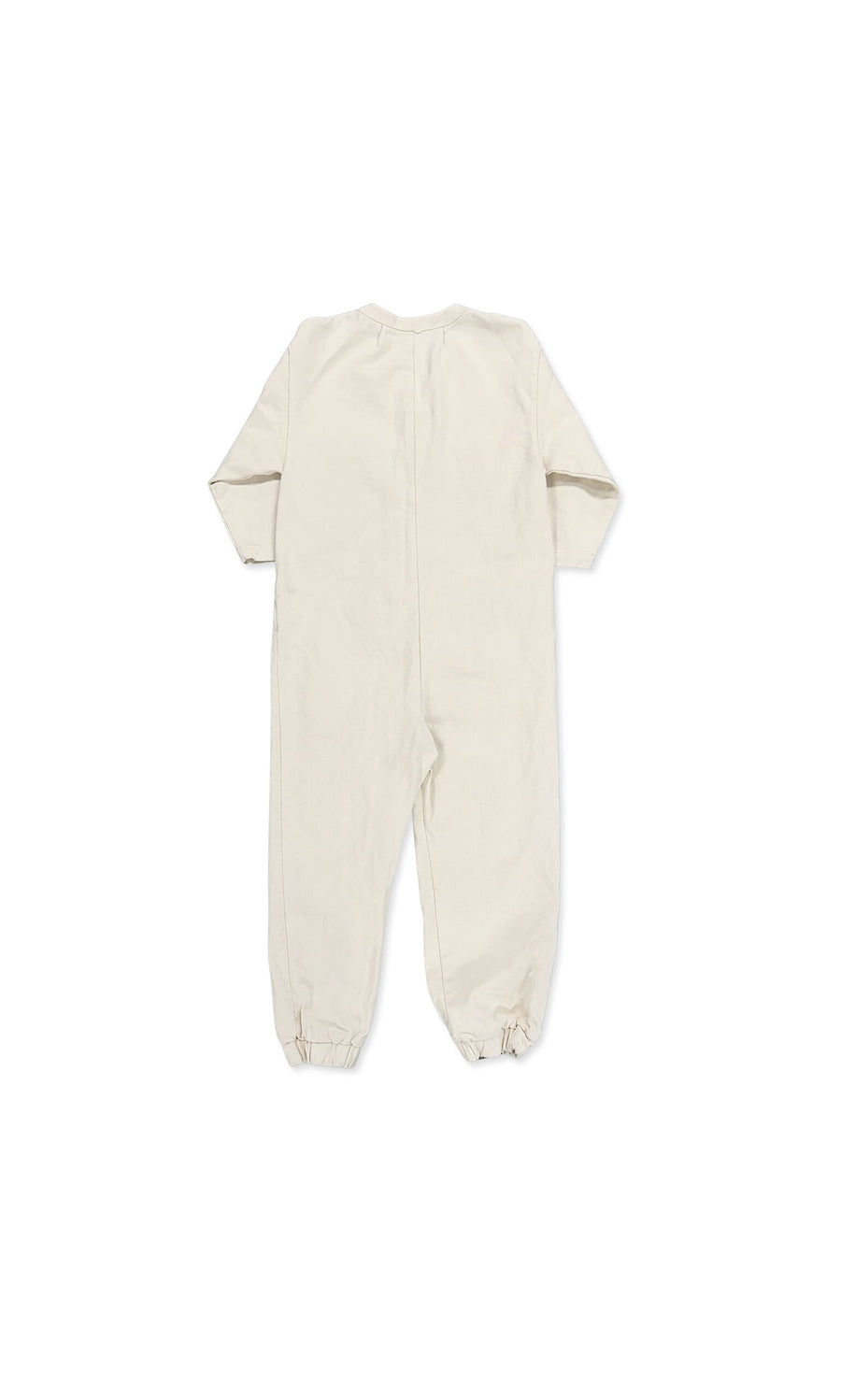 Plümo- Jodie Jumpsuit: Beige long-sleeve baby boiler suit with elasticized ankle cuffs, shown from the back.