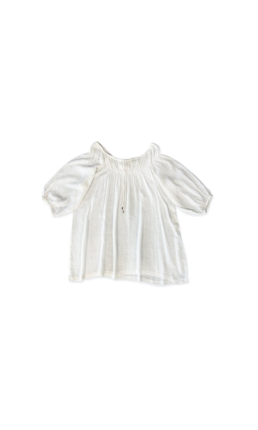 Plümo- Judy Blouse: white, flowy top with relaxed fit, gathered neckline, and puffed sleeves on a white background.