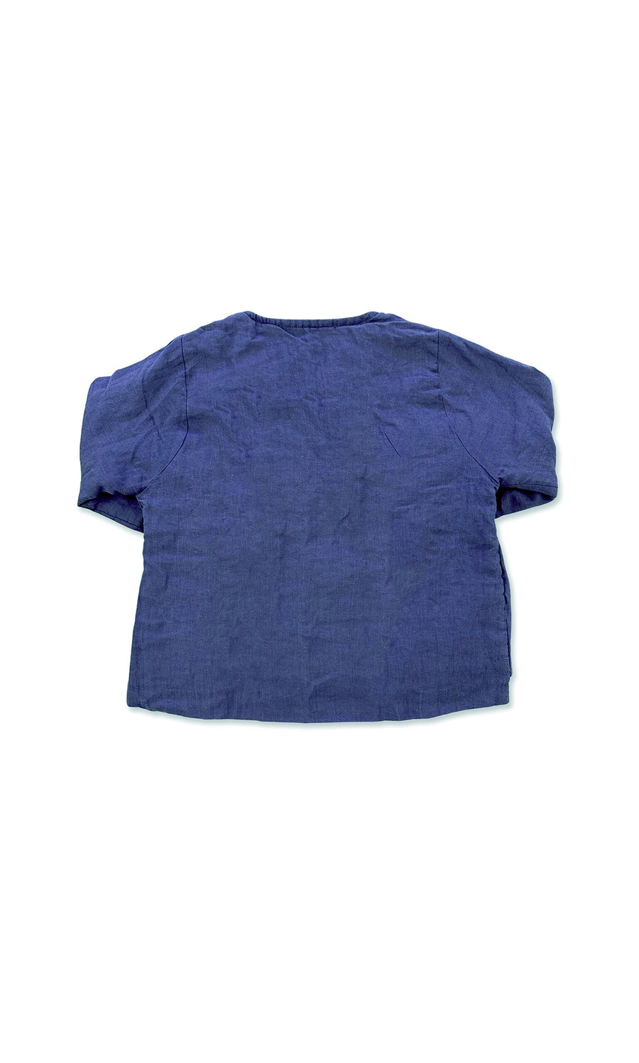 Plümo- Minara Jacket in navy blue linen, short sleeves, padded style, shown flat from the back on white background.