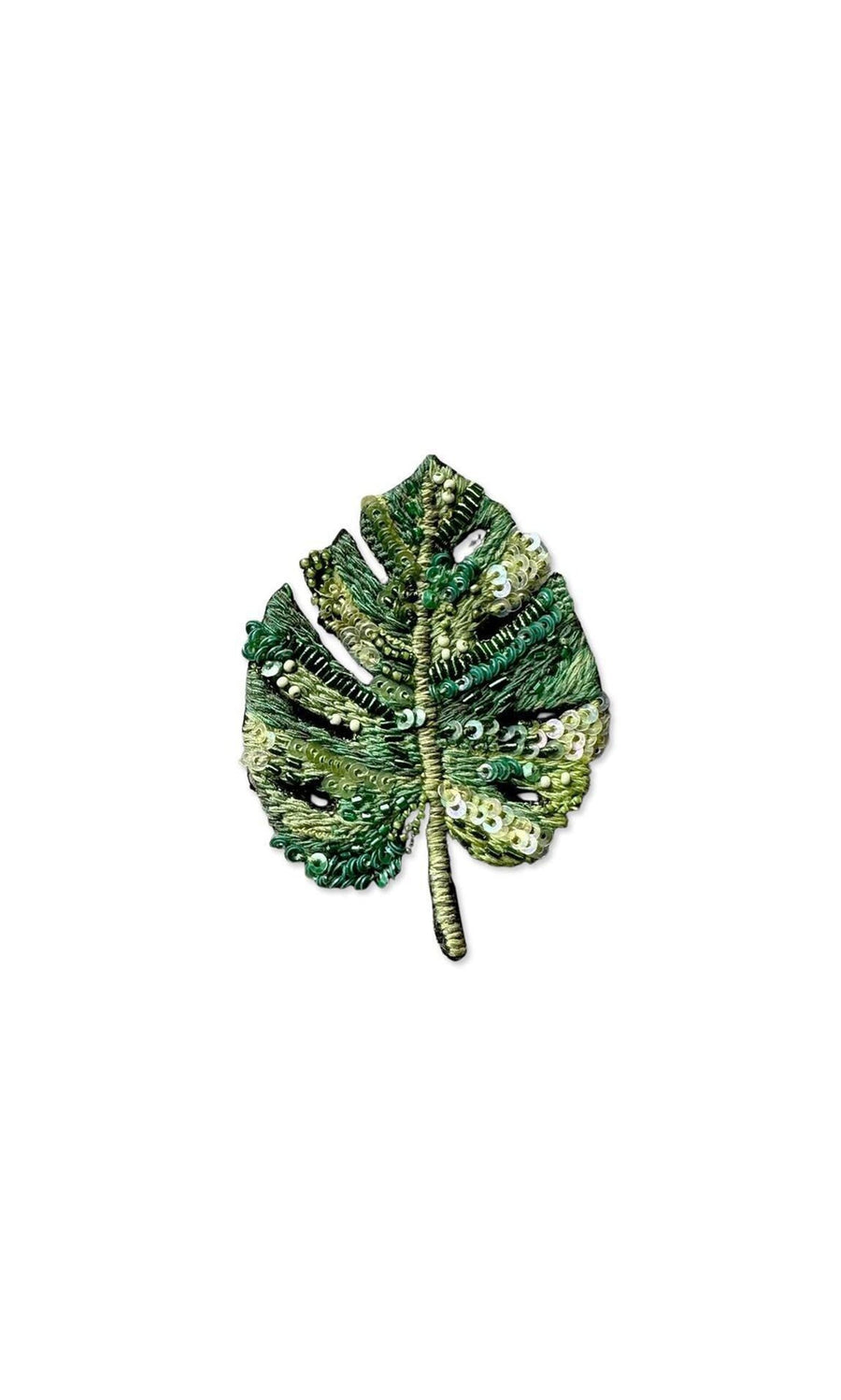 Plümo- Monstera Brooch: Green embroidered monstera leaf with sequins, shown on a white background.