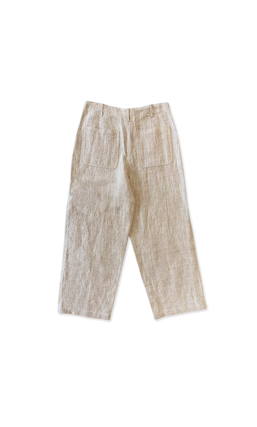 Plümo- Nolan Trousers in beige, high-waisted with back patch pockets, shown laid flat on a white background.