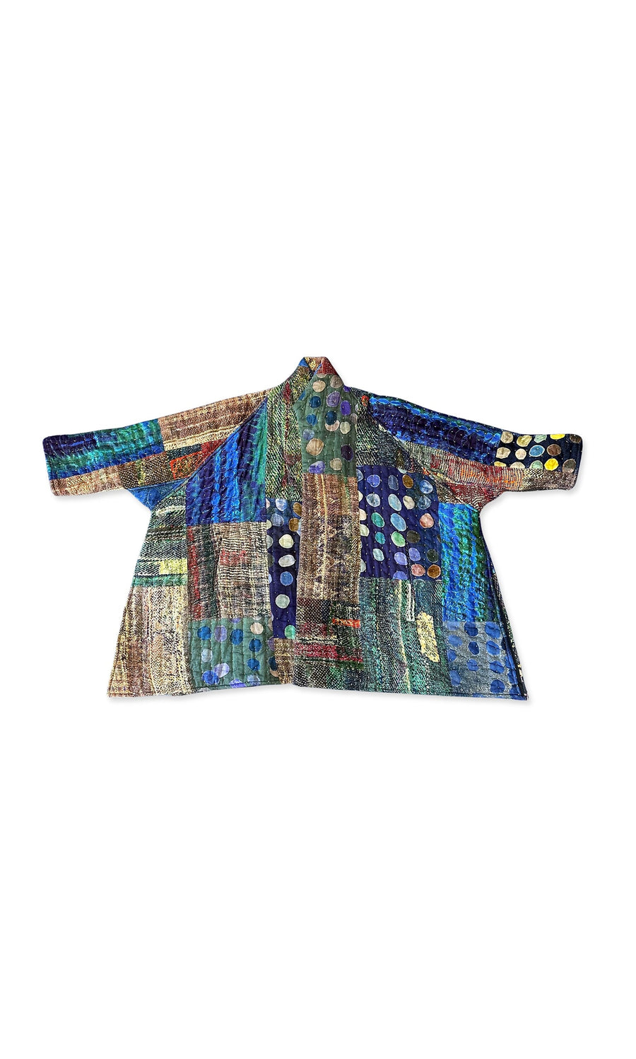 Plümo- The Patch Quilt Kimono features colorful patchwork and circular sleeve motifs, displayed flat on a white background.