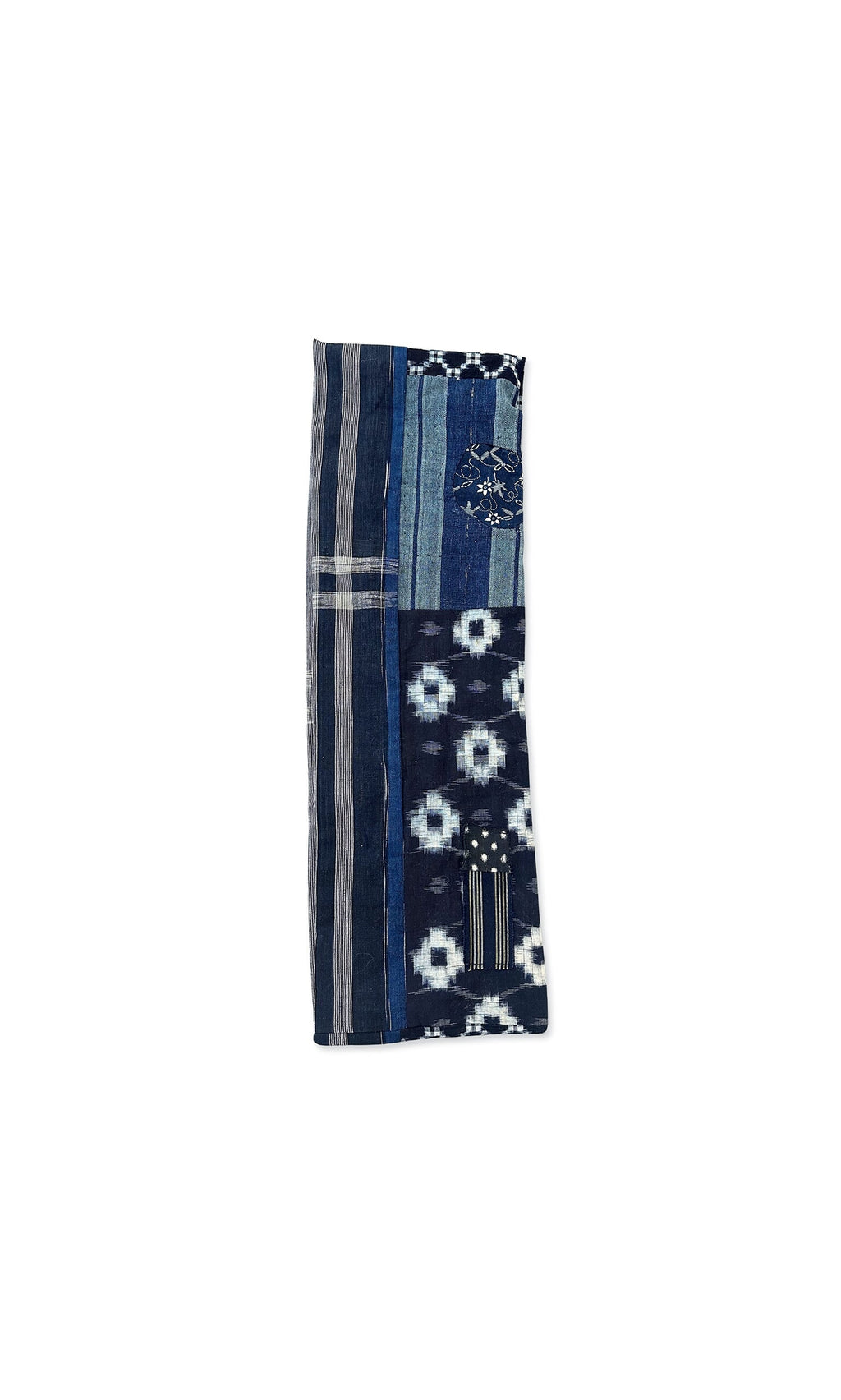 Plümo- The Indigo Patchwork Snood features handcrafted stripes, floral motifs, and traditional blue and white weaving.