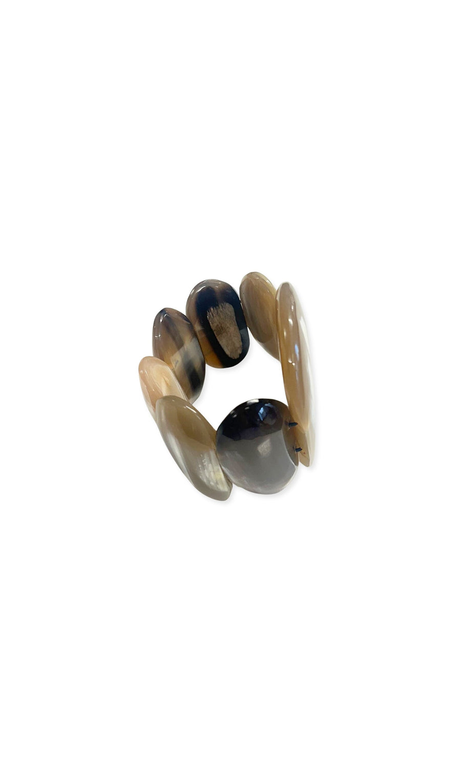 Plümo- The Petra Bracelet features polished oval brown and beige horn pieces, highlighting African craftsmanship.