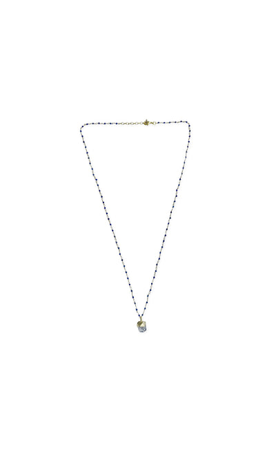 Plümo- The Stina Necklace features a gold heart pendant on a beaded rosary chain with alternating beads, shown on white.