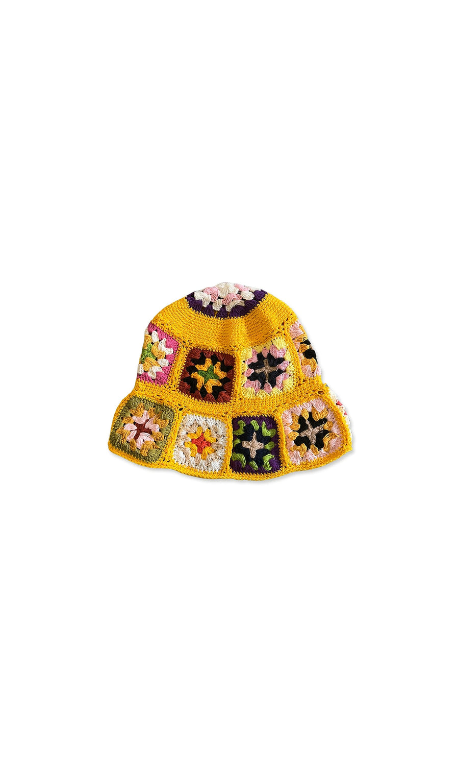 Plümo- The Roxie Hat is a colorful crochet bucket hat with flower granny squares on white for a playful, retro vibe.