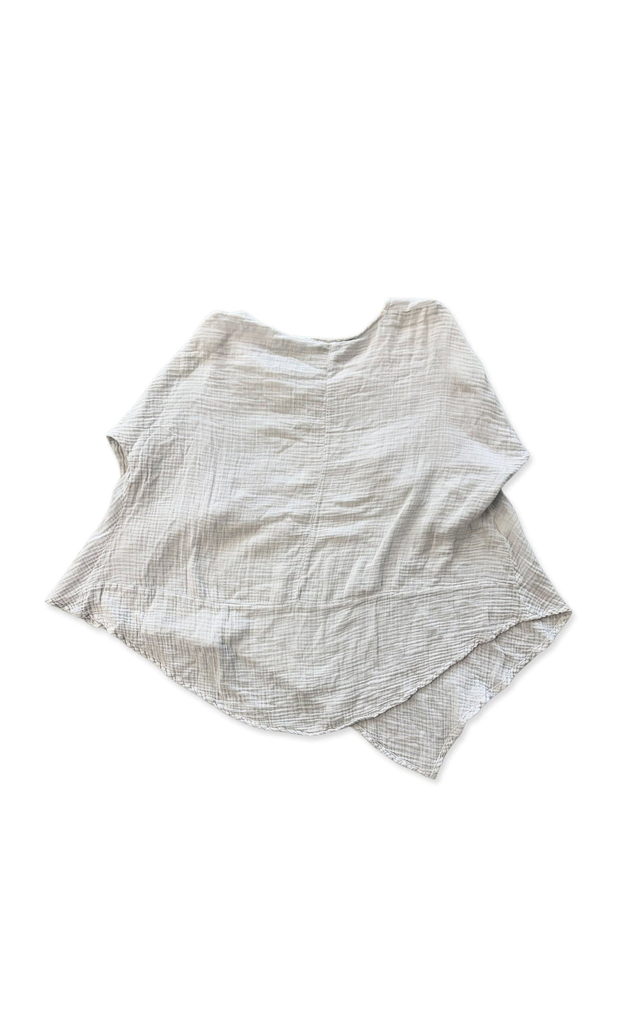 Plümo- Light gray Ellery Blouse, loose-fitting and asymmetrical, in textured muslin waffle fabric, laid flat on white.