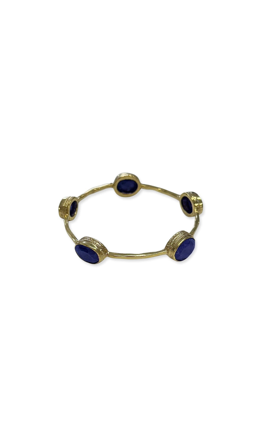 Plümo- Indigo Bangle - Gold: features five oval, semi-precious dark blue stones evenly spaced on a gold-plated band.