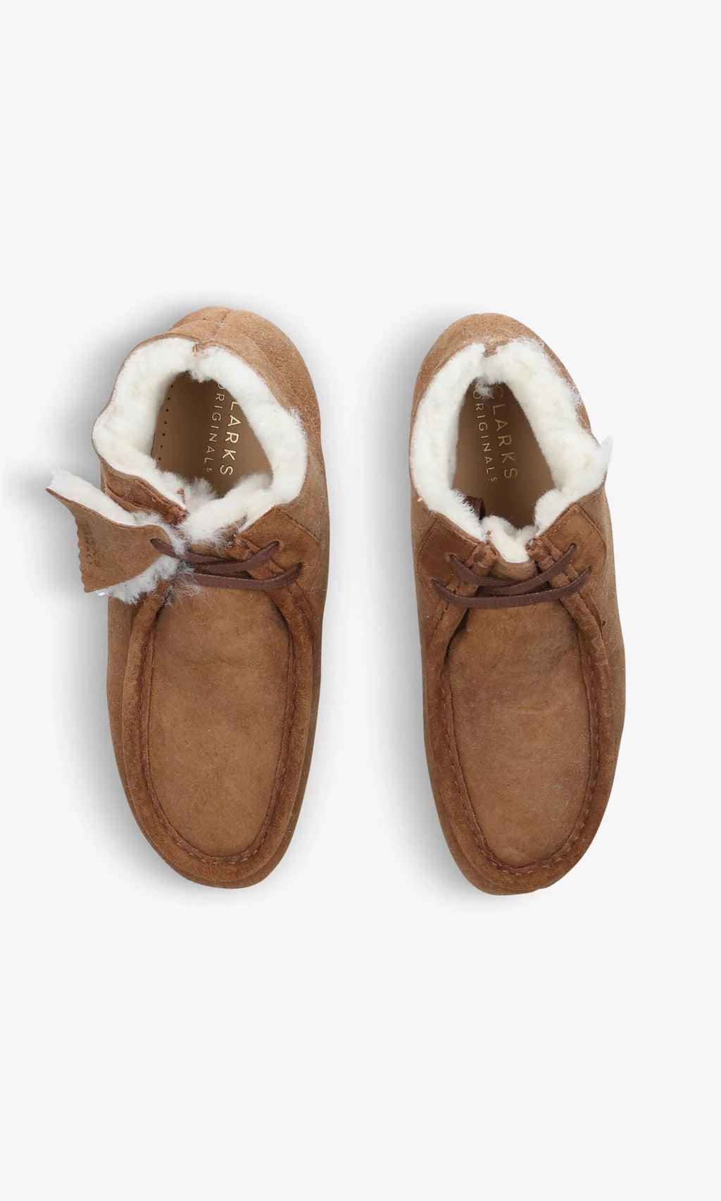 Plümo- The Wallabee Boot in tan suede with shearling lining, shown from above on a white background.